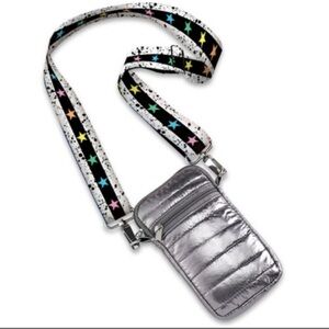 This is a Top Trenz Puffer Cell Bag with an original striped tie-dye strap
